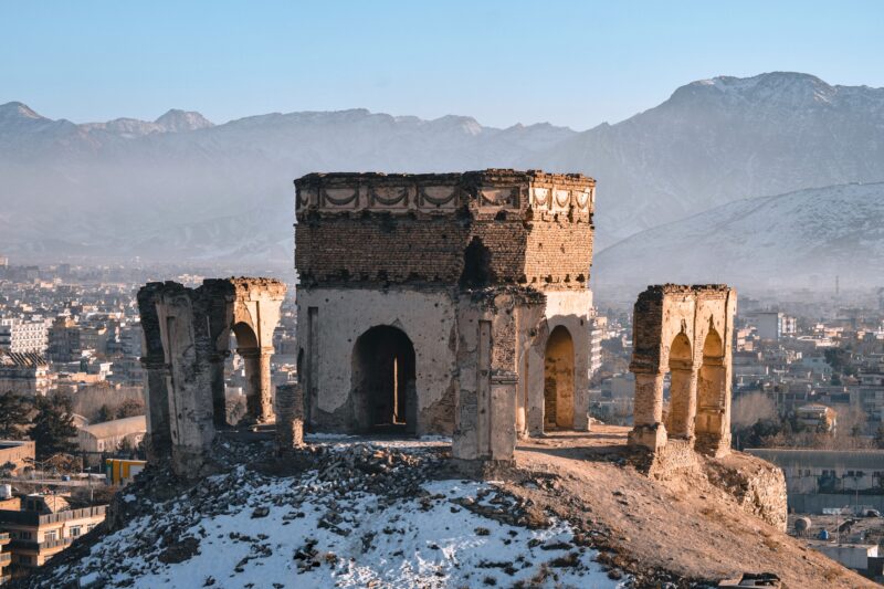 Aerial cityscape of Kabul with mountains
